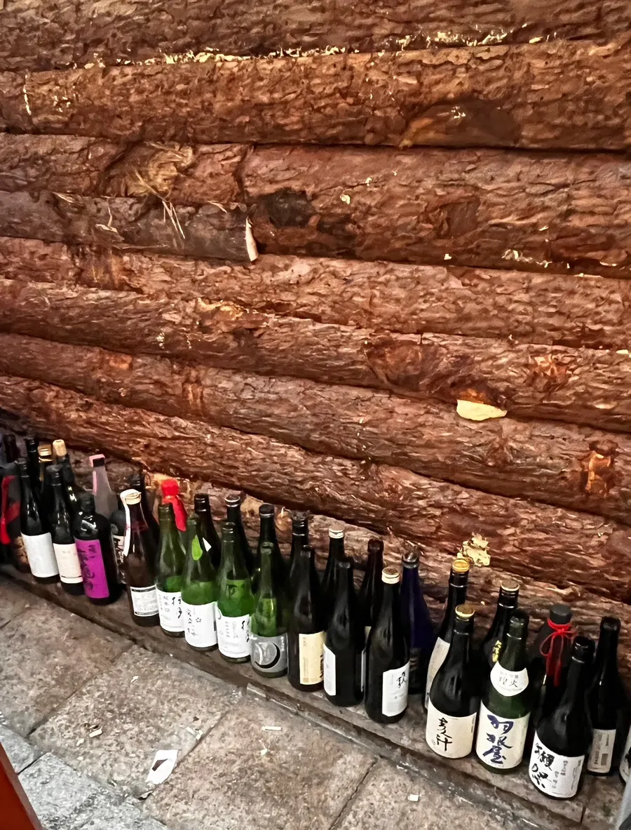 Rows of sake bottles at the entrance