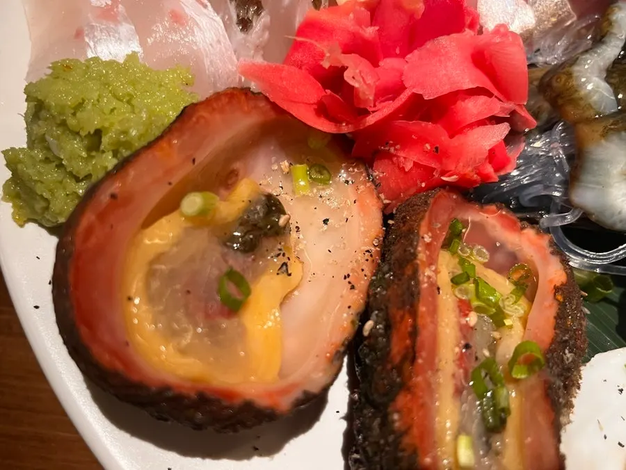 Plate of warty sea squirt and assorted seafood
