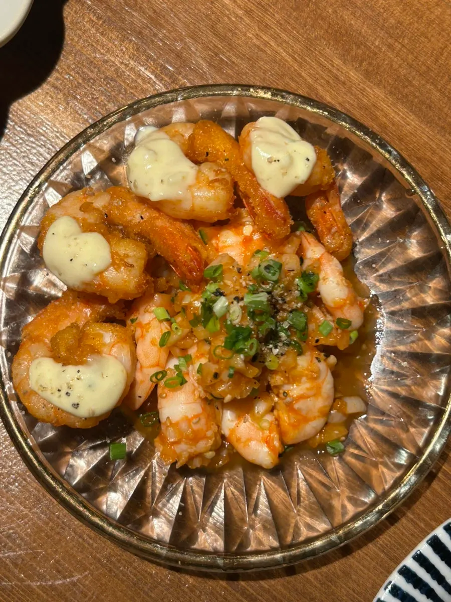 Seasoned rice, seaweed, and aged kimchi served with the raw fish