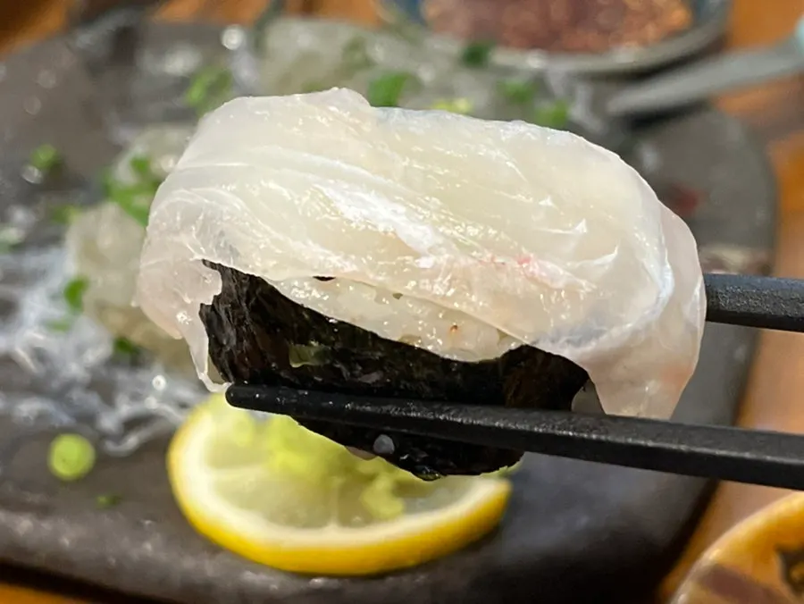 Flounder sashimi placed on top of salt gimbap