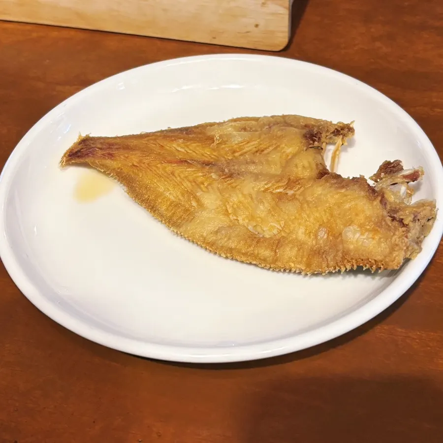 Complimentary fried flounder served at Susan Jang