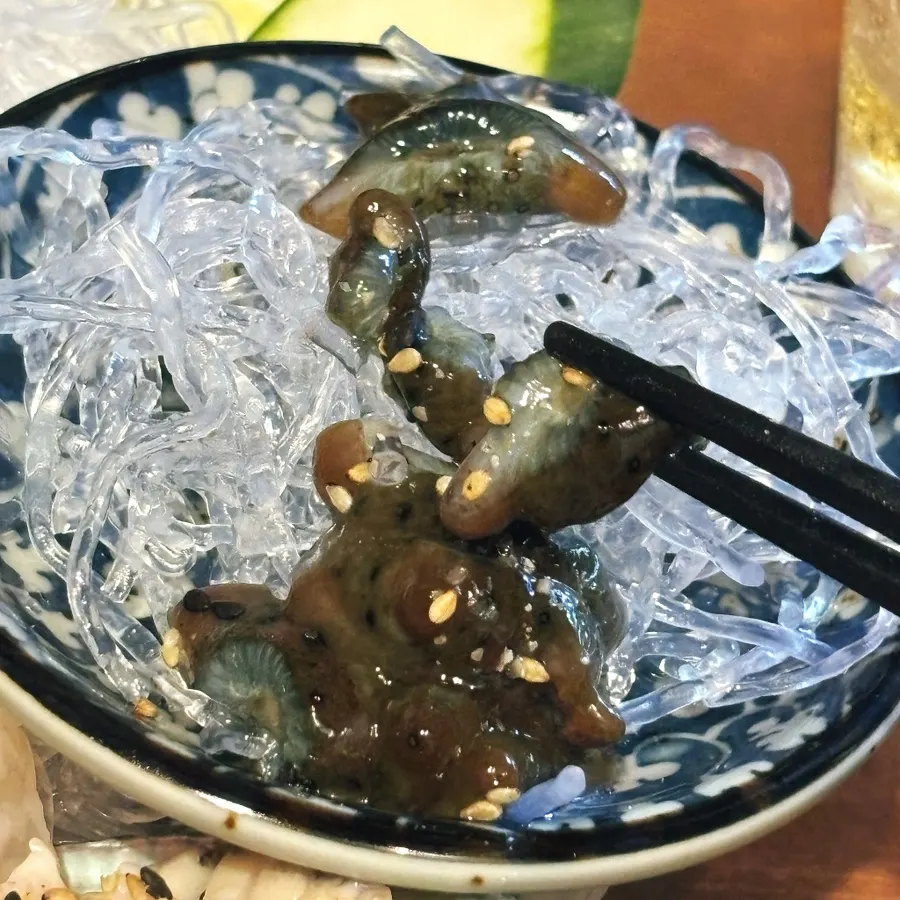 Sea cucumber tossed in sesame oil and sesame seeds
