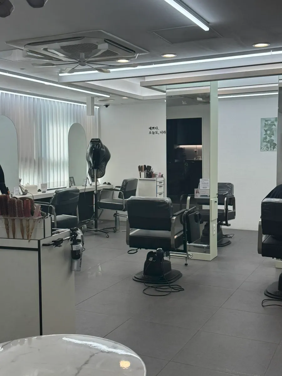 View of the white-tone salon interior