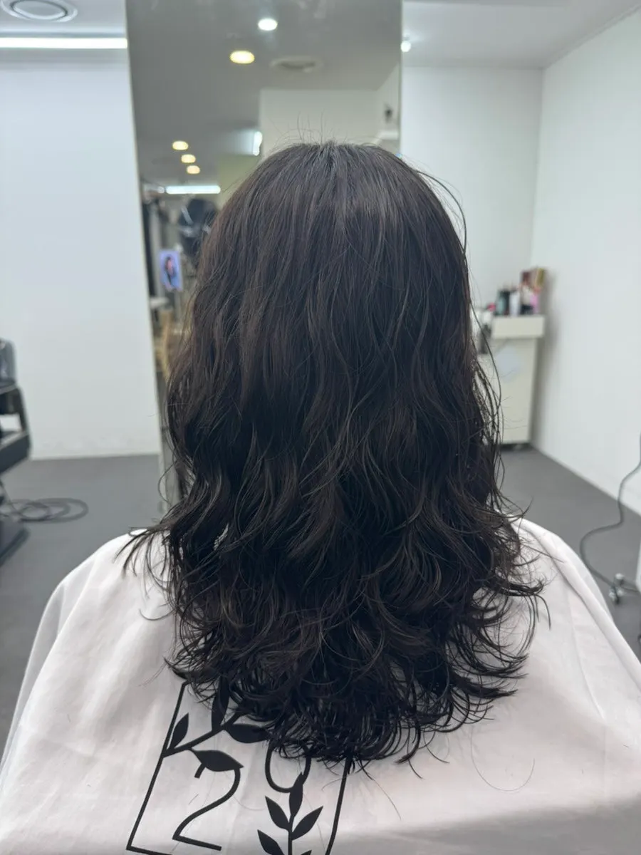 Hair trimmed to medium length