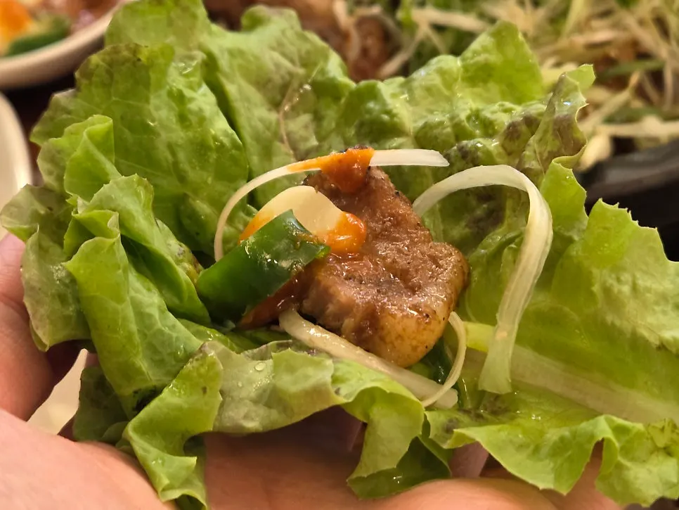Seokgalbi served as a lettuce ssam wrap