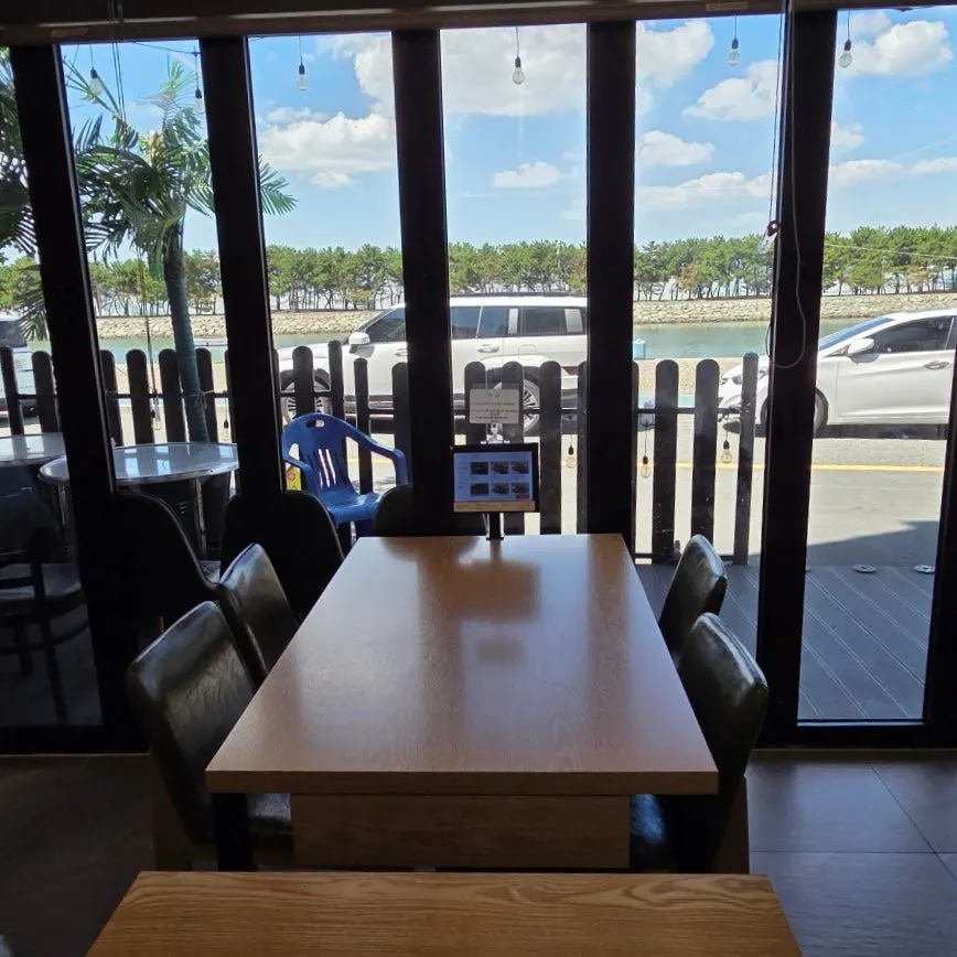 Trademark registration and fishing license documents on display inside the restaurant