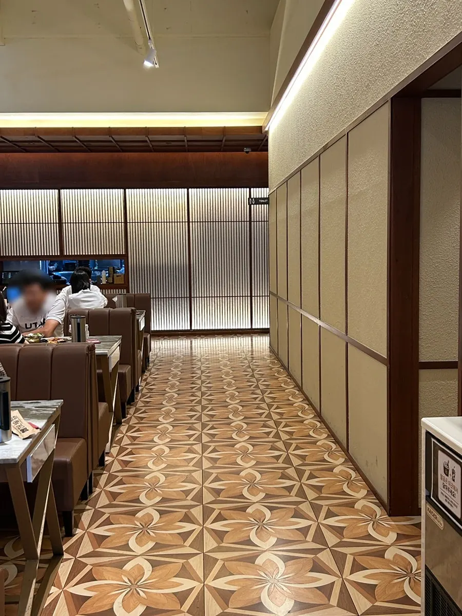 Spacious, clean main dining hall at Haenyeo Sotbap