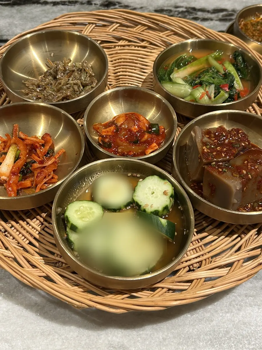 Table set with banchan at Haenyeo Sotbap