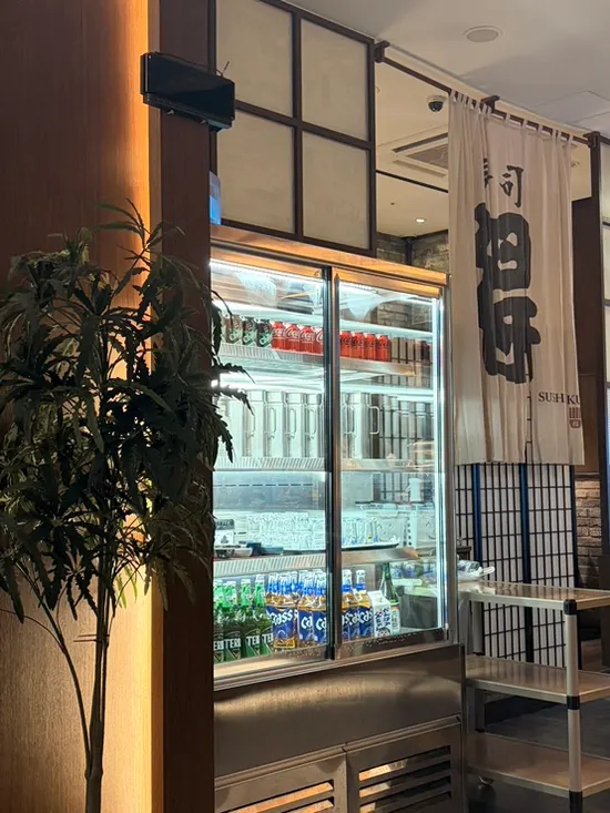 Interior view with a drink fridge next to the table