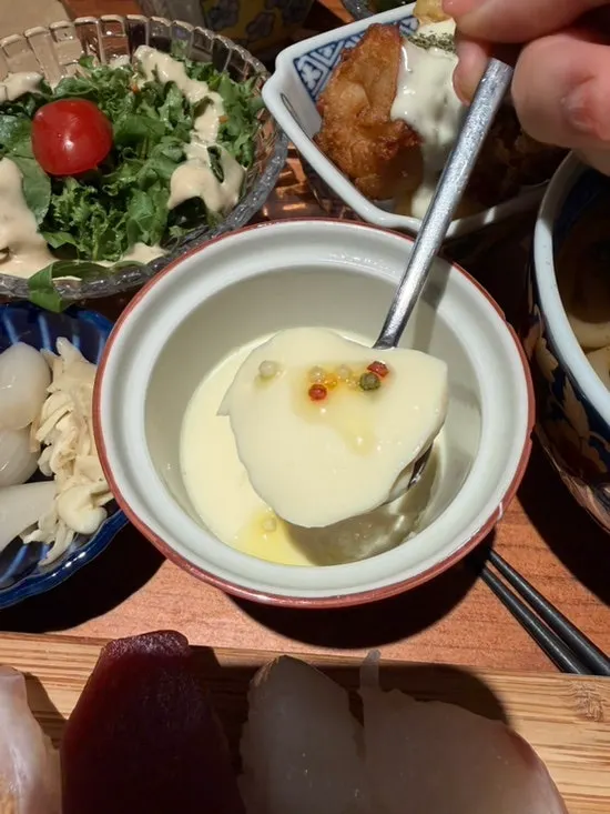 A spoonful of warm steamed egg custard