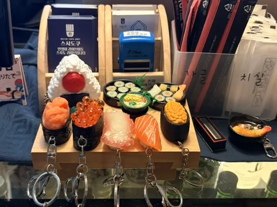 Sushi-shaped key ring at the counter
