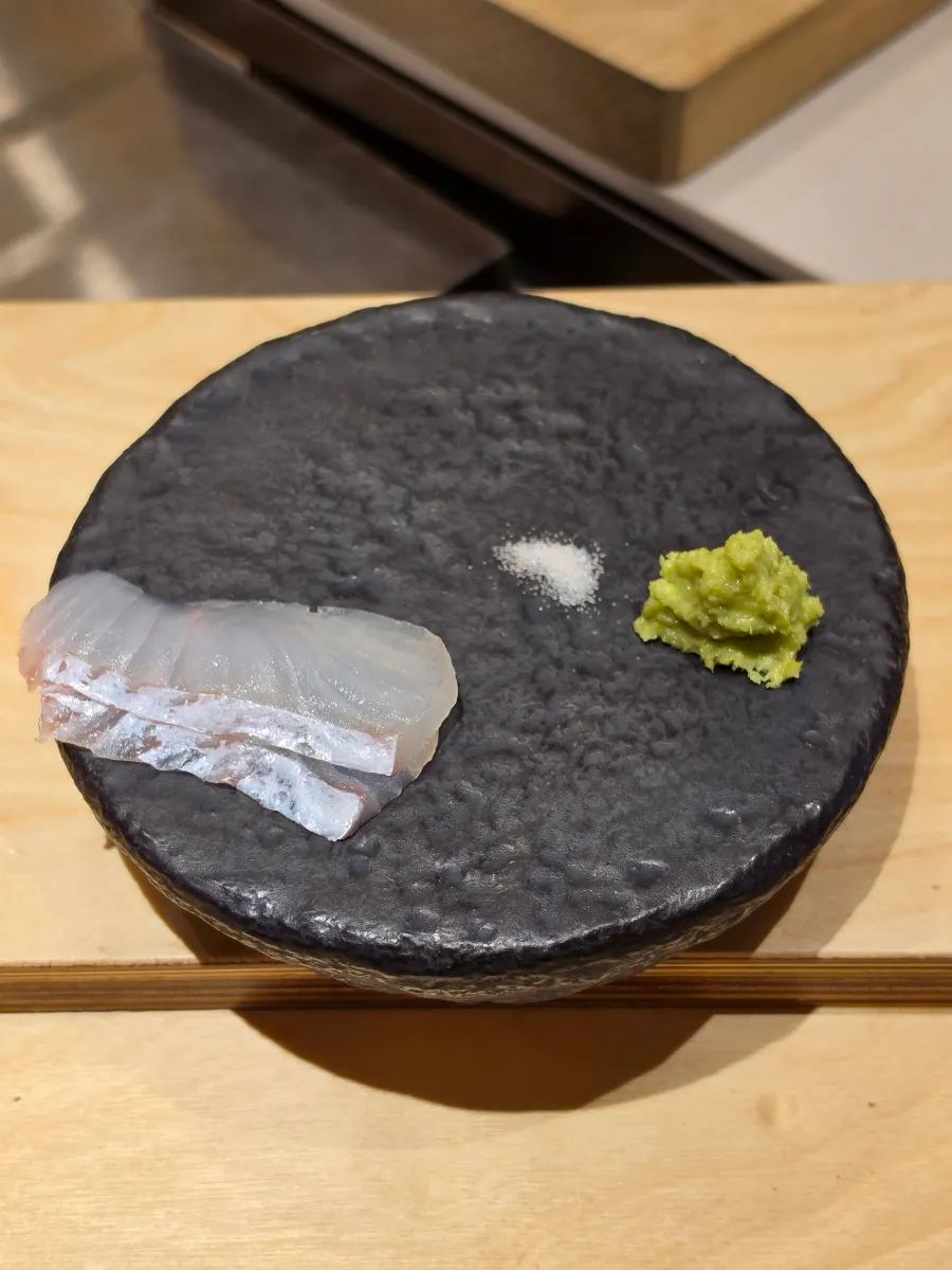 Halibut sashimi served with wasabi