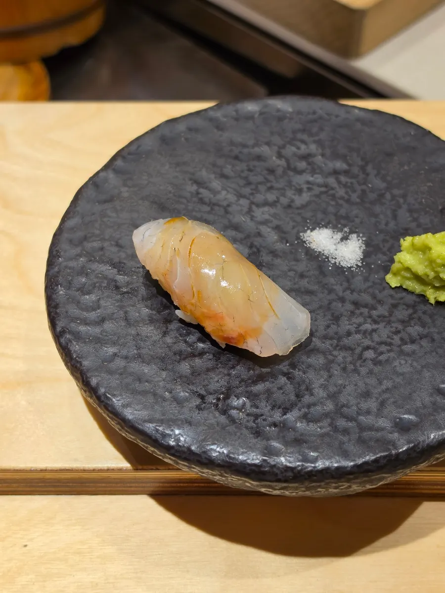 Red seabream nigiri with fried scallion inside