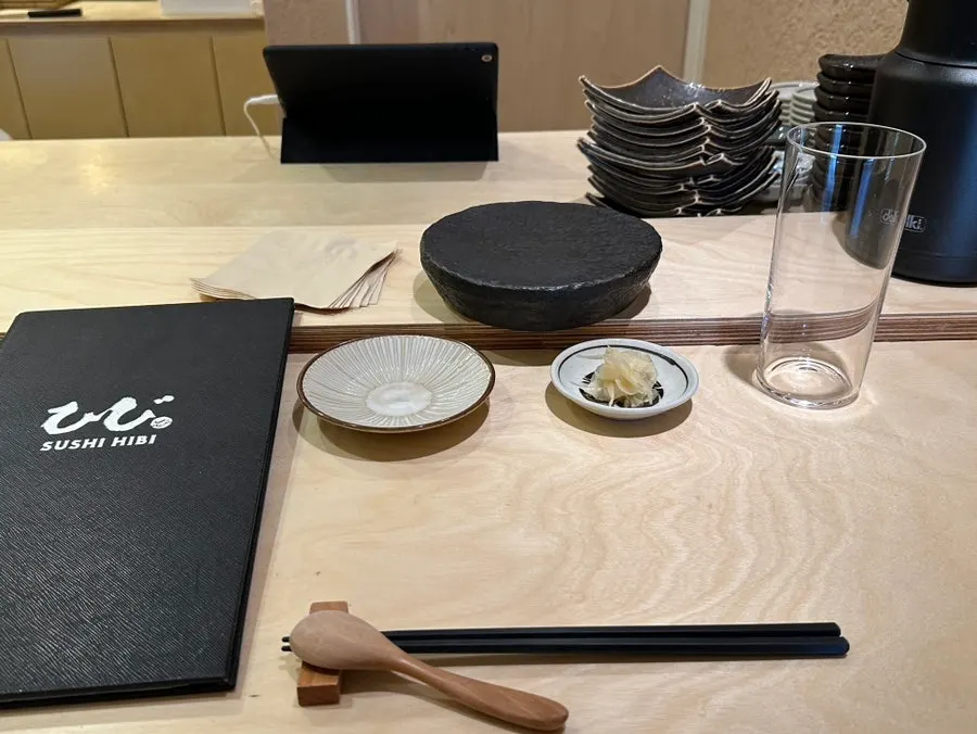 Counter seat setting with menu and basic tableware