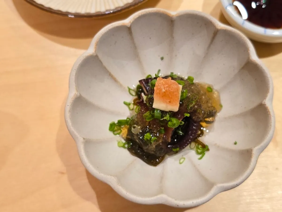 A piece of Sushi Hibi sushi highlighting the ingredient's aroma and texture