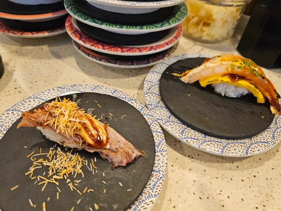 Encore round of shrimp flying fish roe sushi