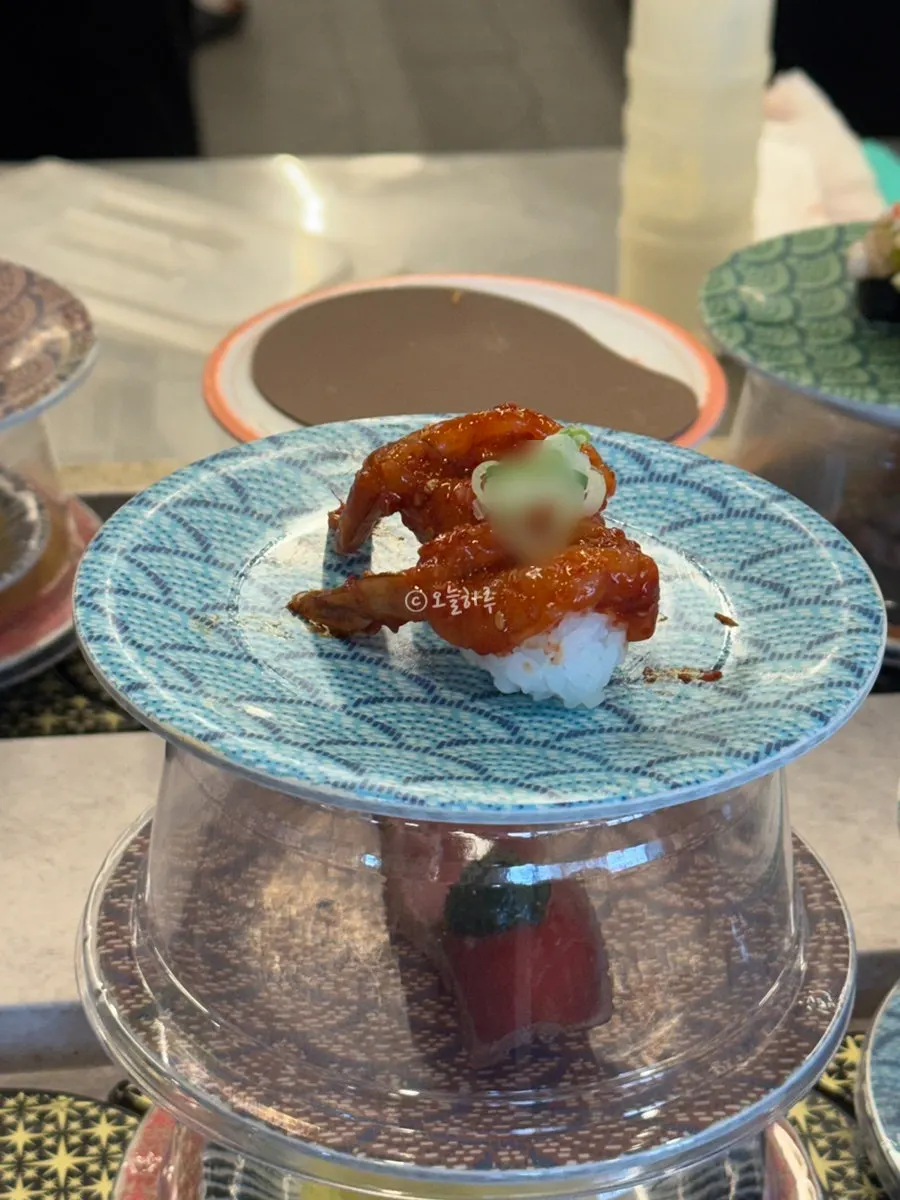 Sushi plates picked off the belt
