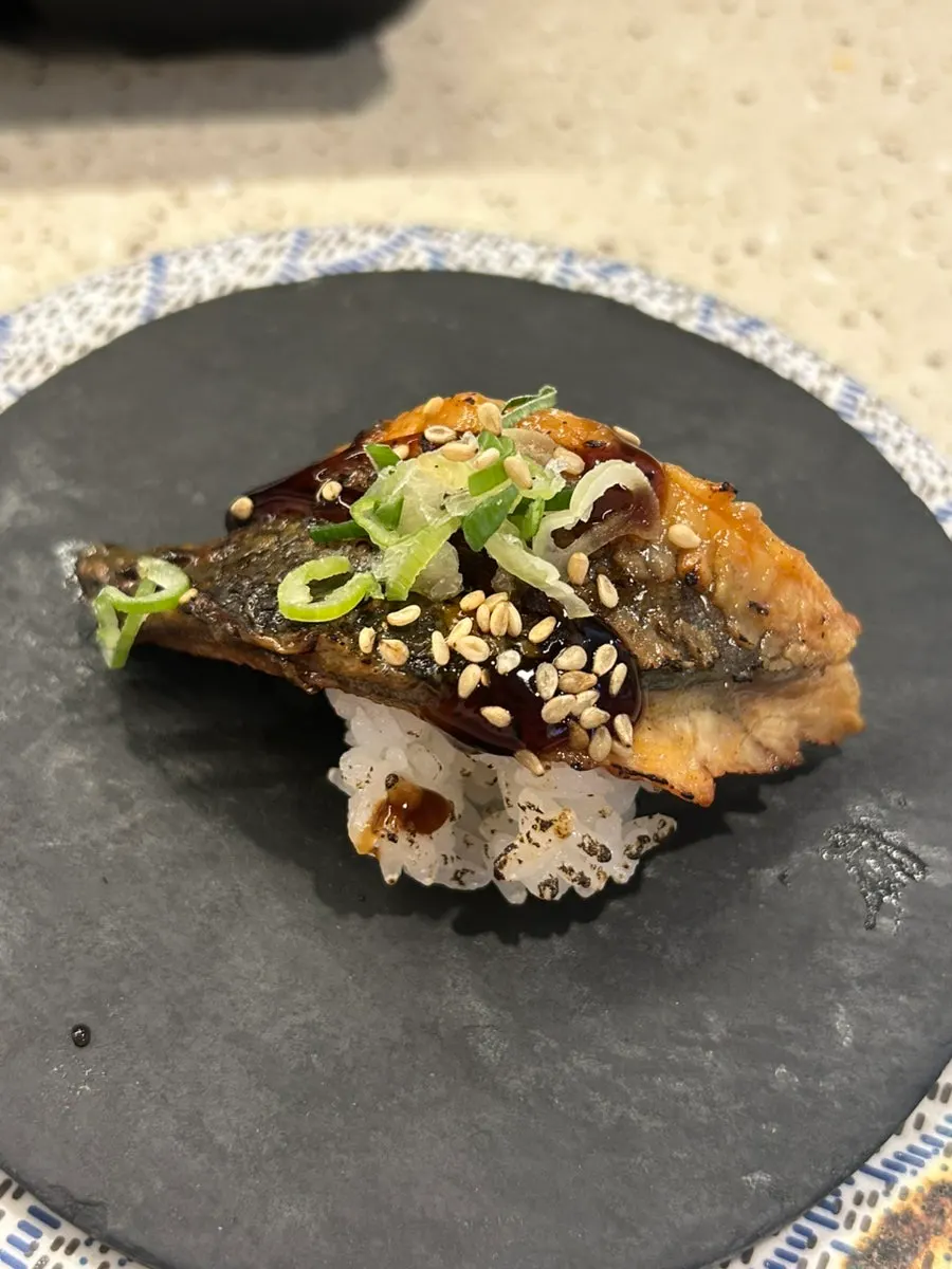 Woo samgyeop nigiri topped with bossam kimchi