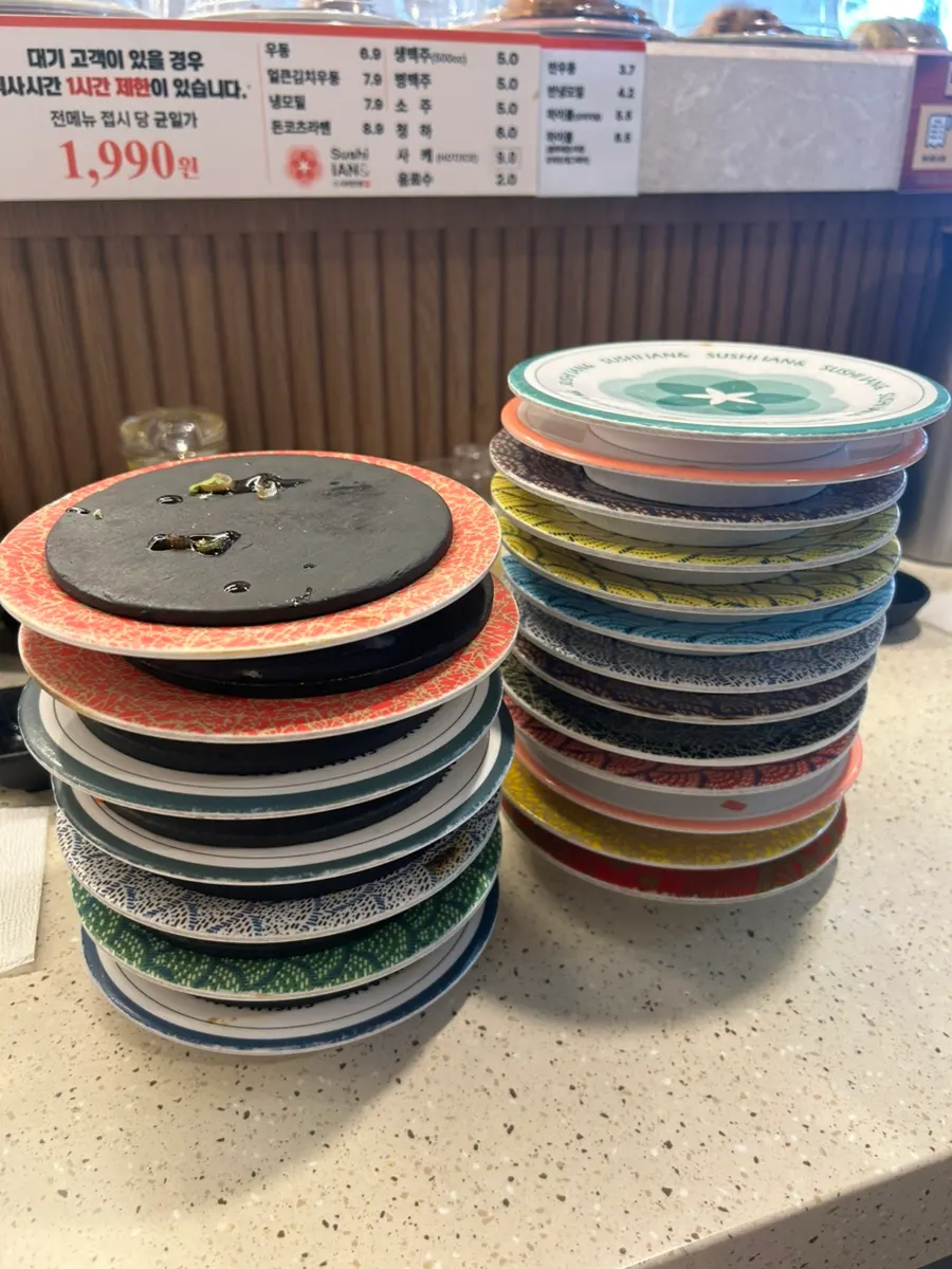 Stack of empty sushi plates after finishing the meal
