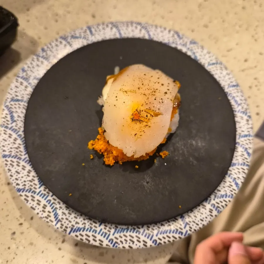 A collection of sushi plates picked from the rail