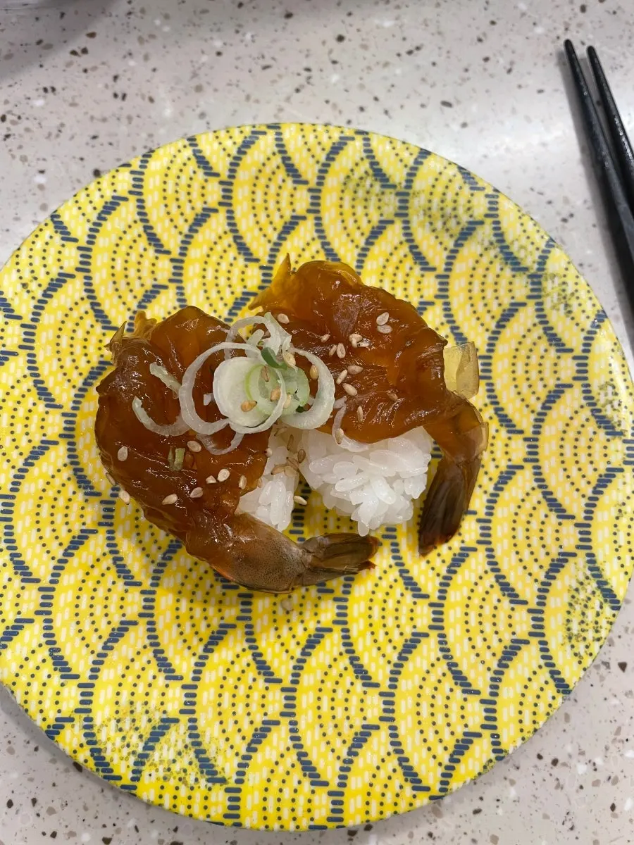 Vinegared shrimp sushi and soy sauce shrimp sushi