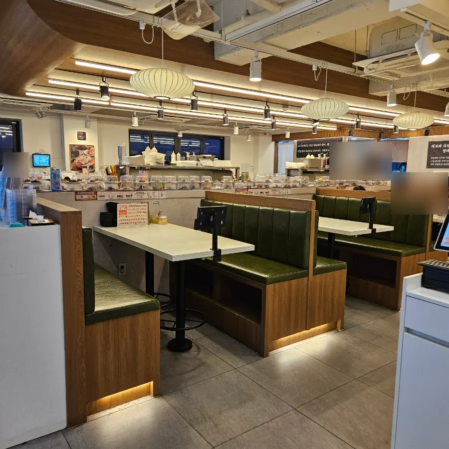 Interior view of the restaurant with the conveyor-belt sushi rail