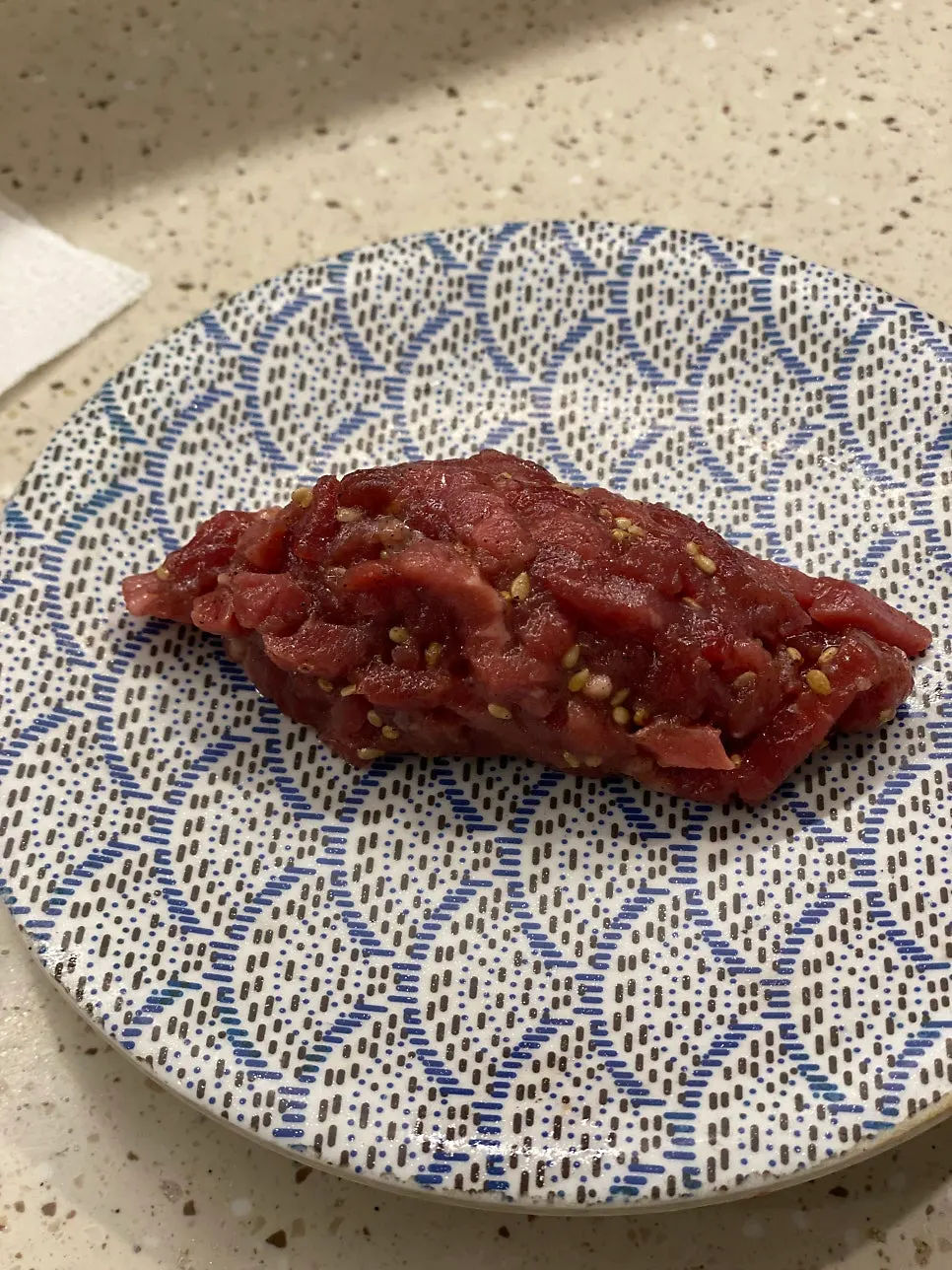 A plate of yukhoe (raw beef) sushi