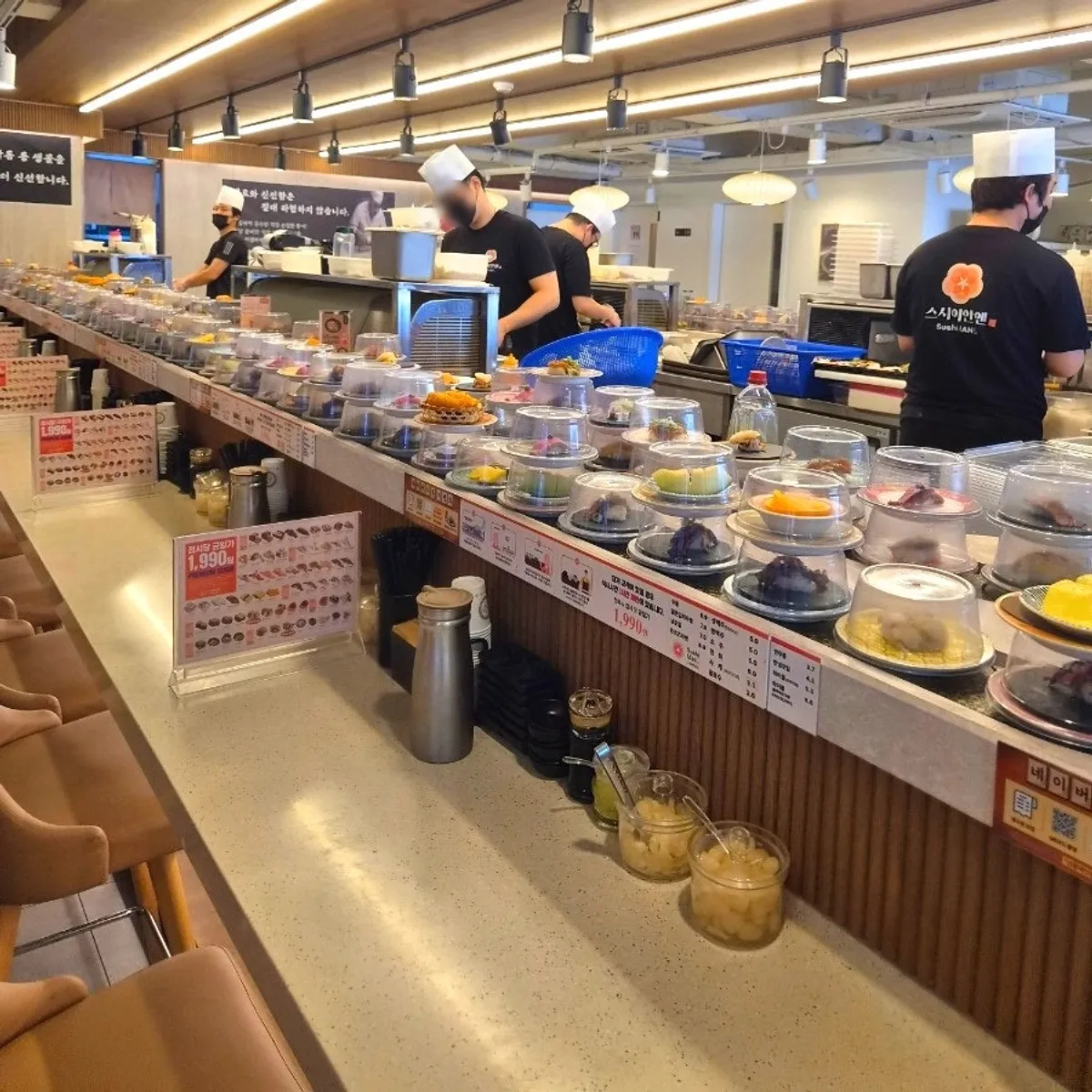 Sign noting every conveyor-belt sushi plate is ₩1,990