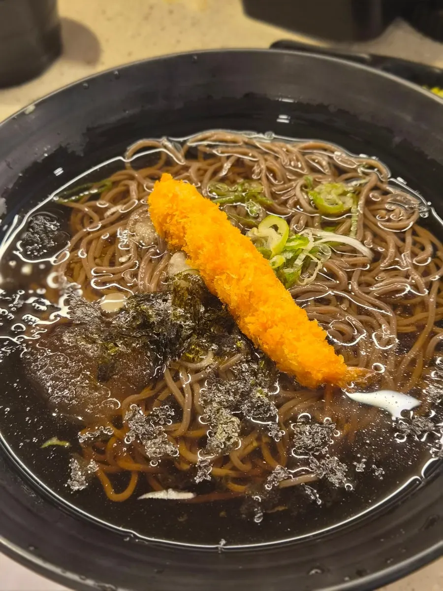 A plate topped with meat-based sushi