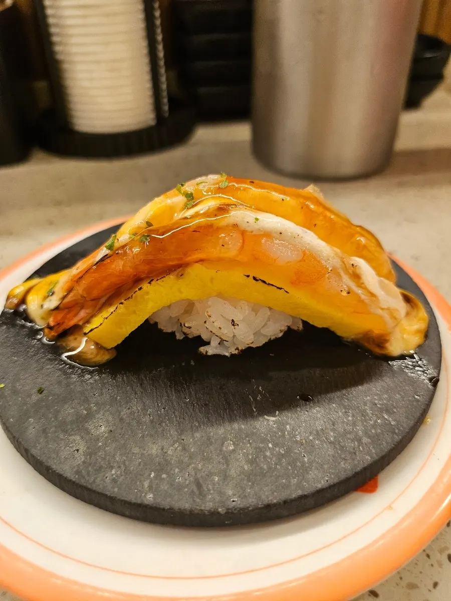 A plate of the Best 1 egg shrimp nigiri