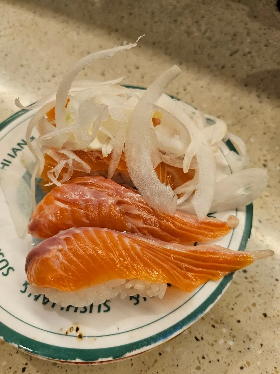 A plate of soy sauce shrimp nigiri