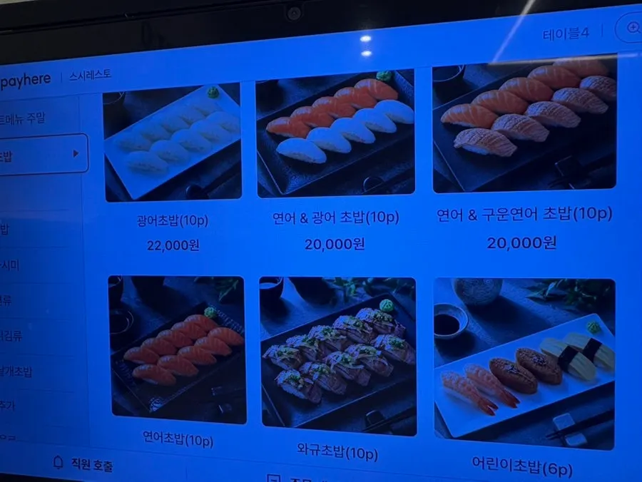 A menu board with soba, udon, and tempura
