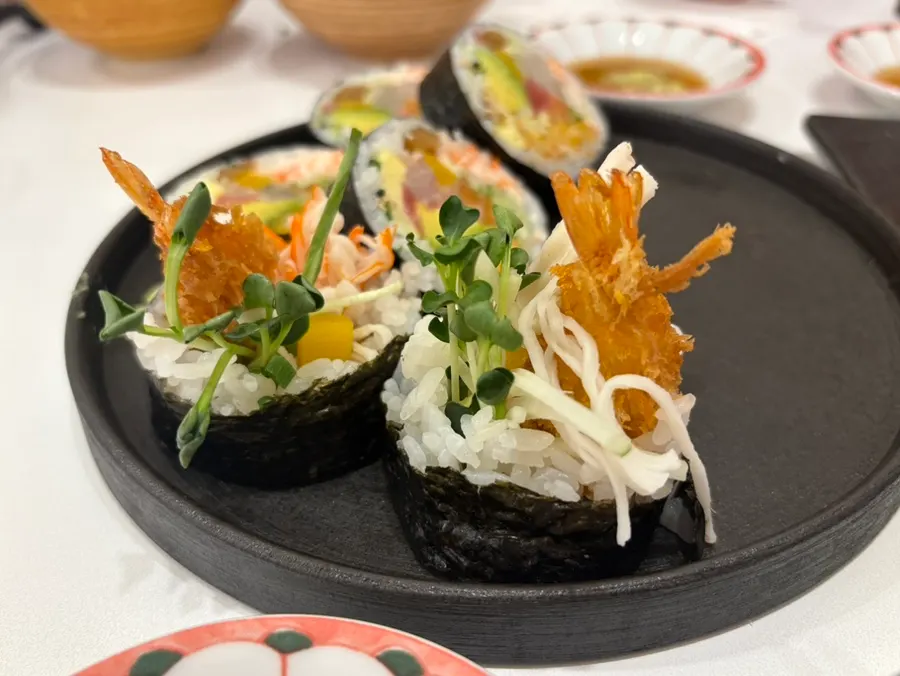 A plate of sushi topped with a variety of neta (toppings)
