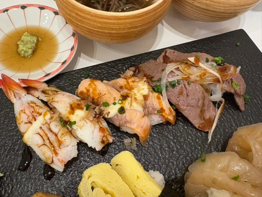 A close-up of colorfully arranged sushi