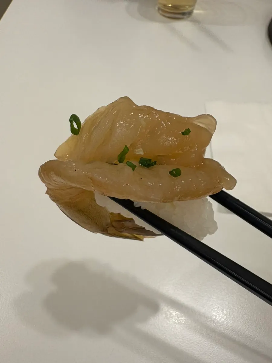 A piece of shrimp sushi