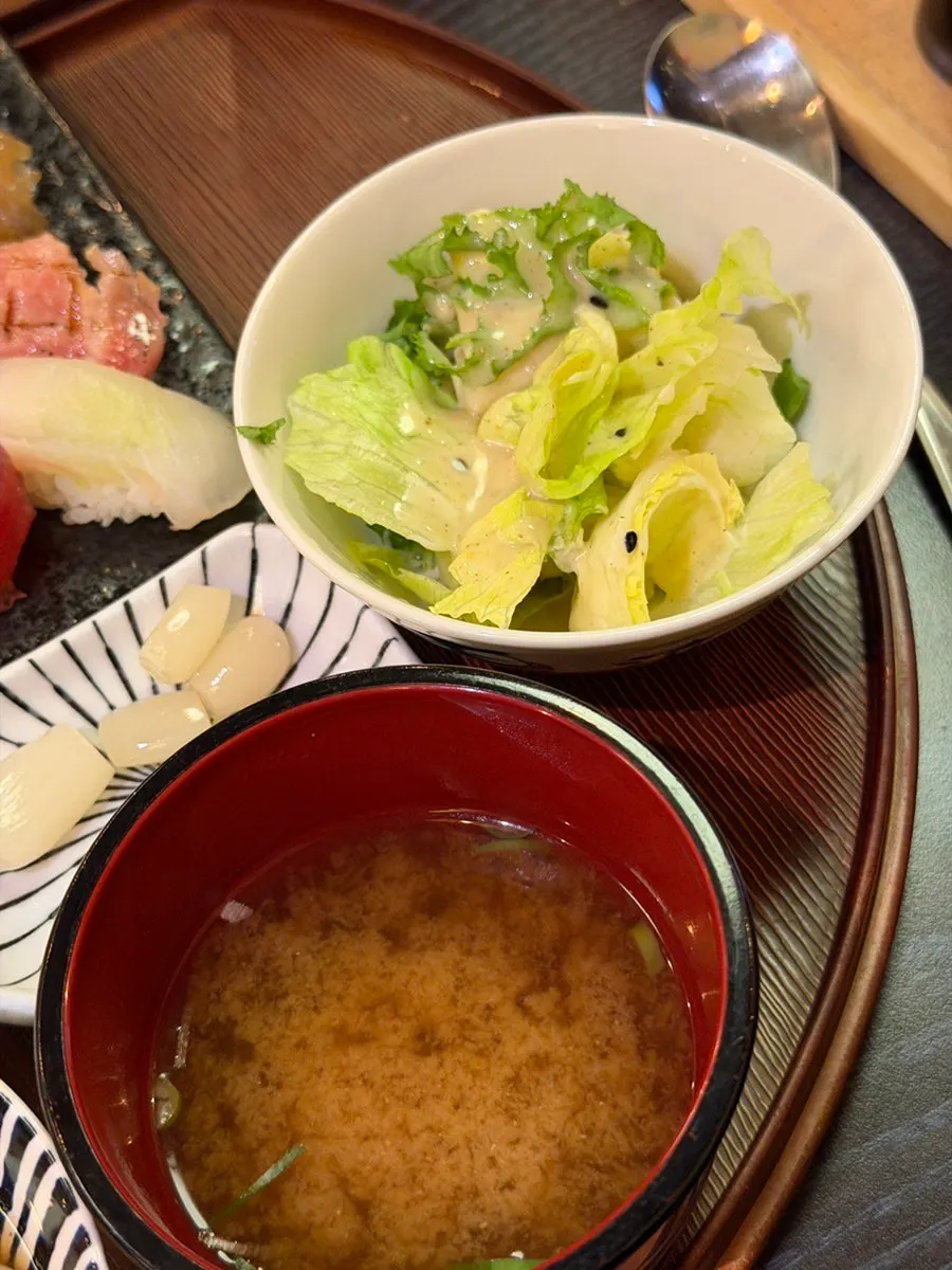 Clear broth soup served with the sushi