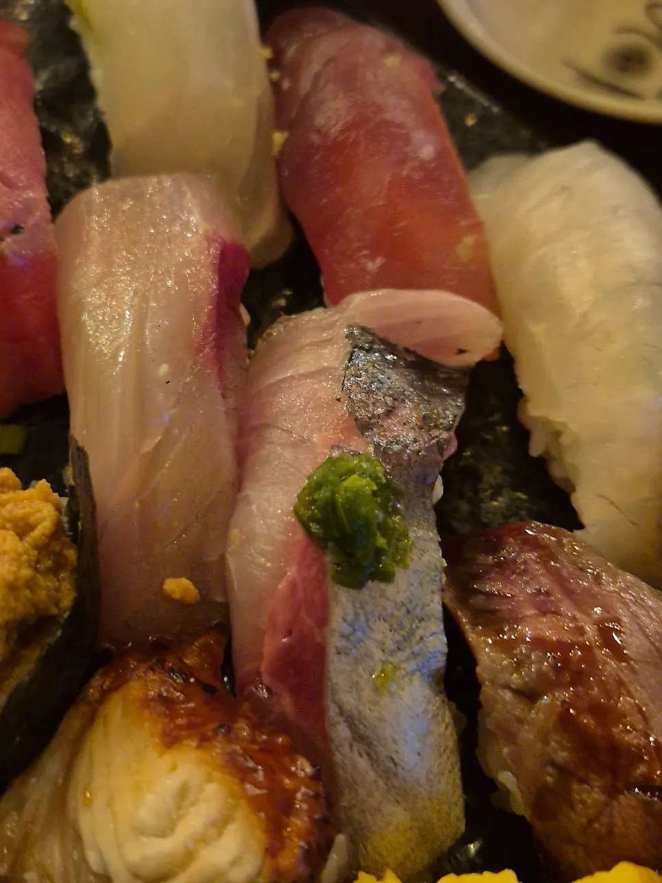 Close-up of sushi made with aged live fish