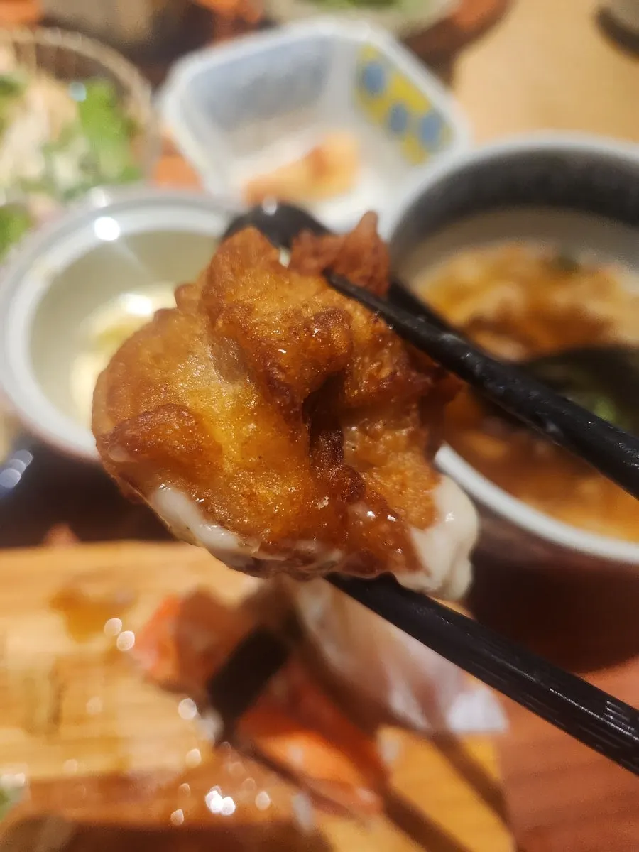 Sushi dipped in soy sauce