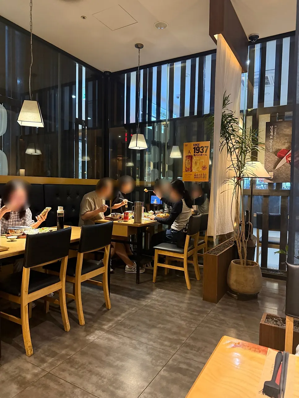 Calm-toned dining hall seating at the Japanese restaurant