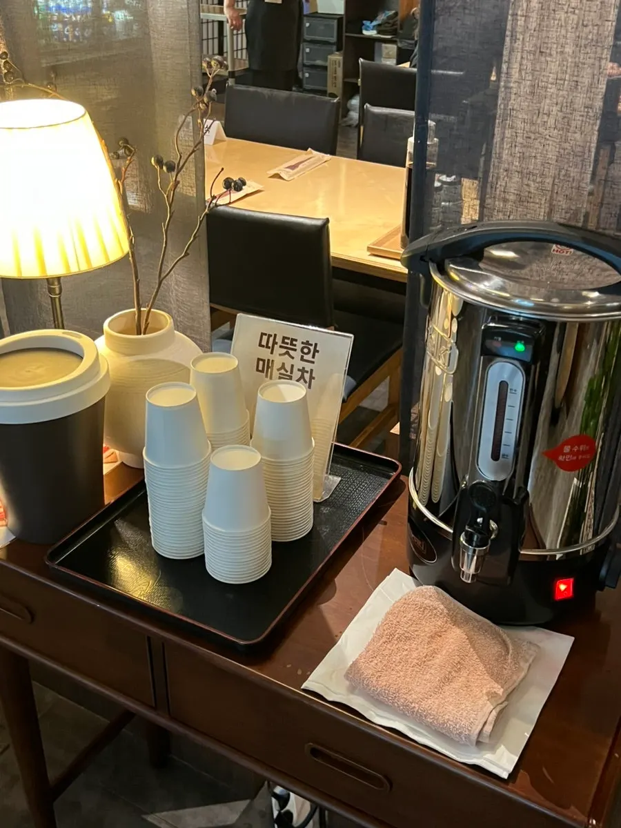 Warm plum tea served on the way out