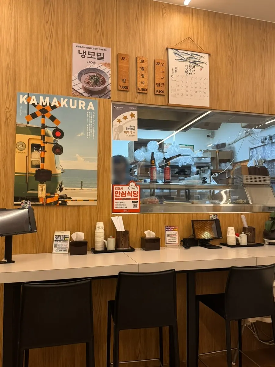 The spacious, clean interior of Sushi Hwa