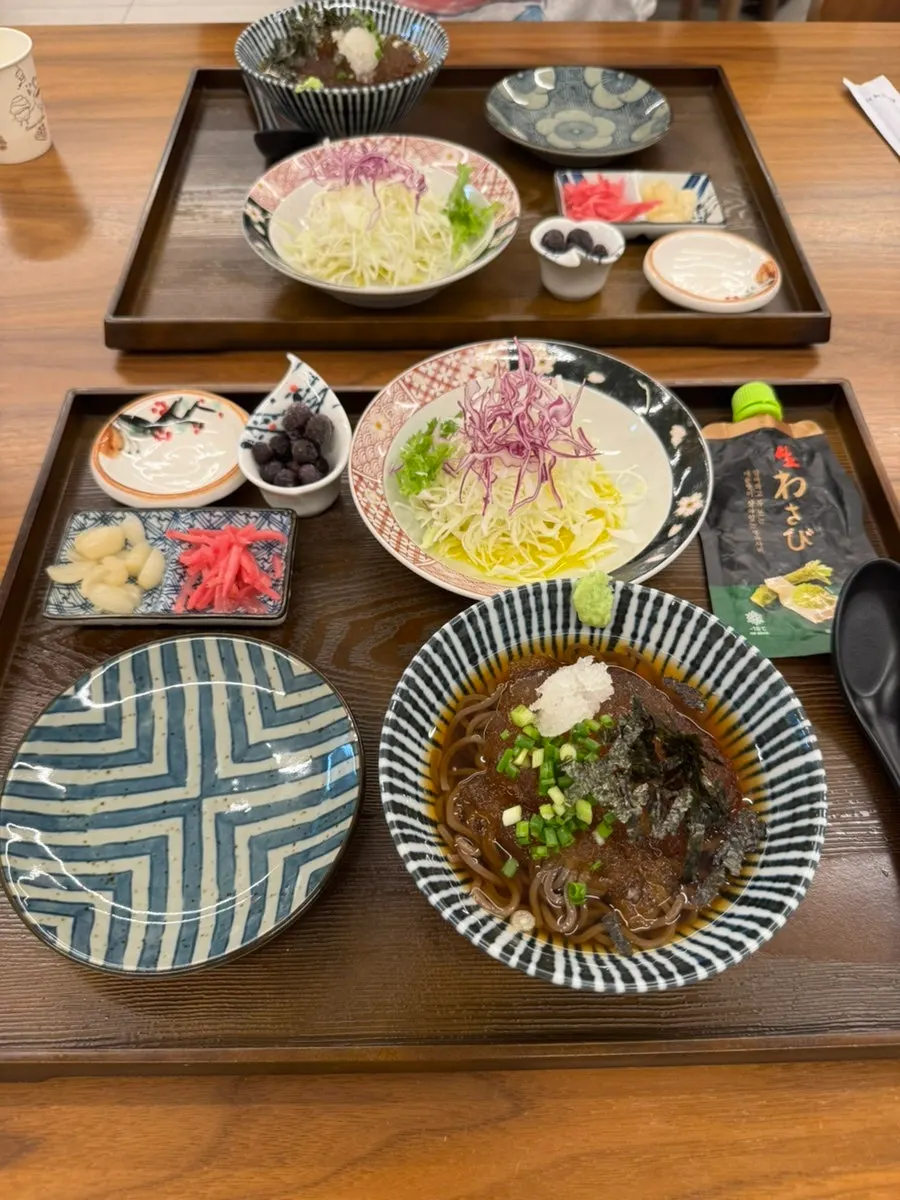 Sushi Hwa's rice bowl and noodle menu board