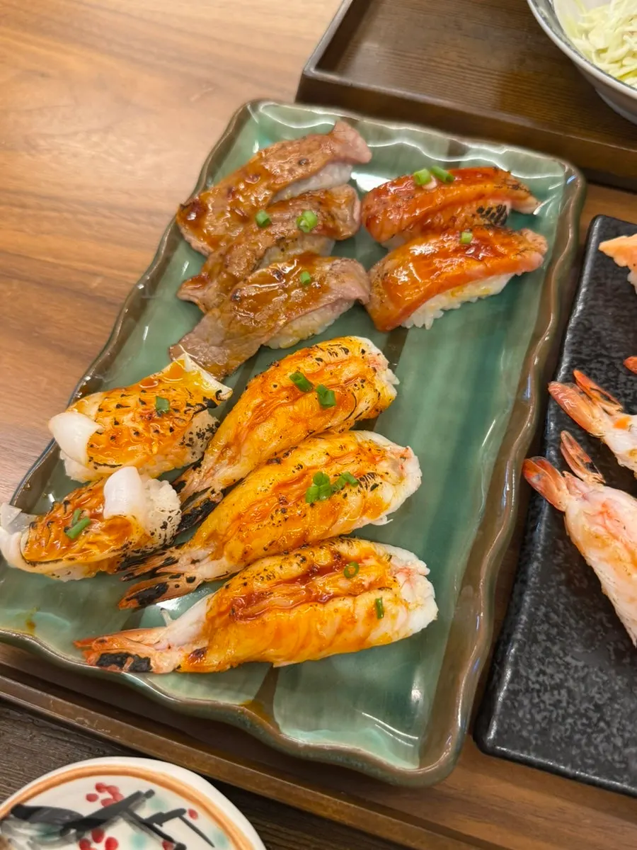 A sushi selection with salmon, tuna, shrimp and wagyu
