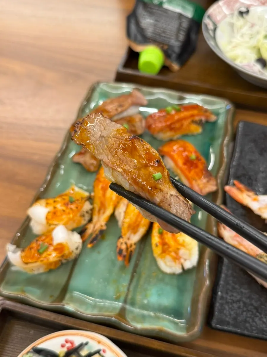 Close-up of smoky, flame-seared sushi