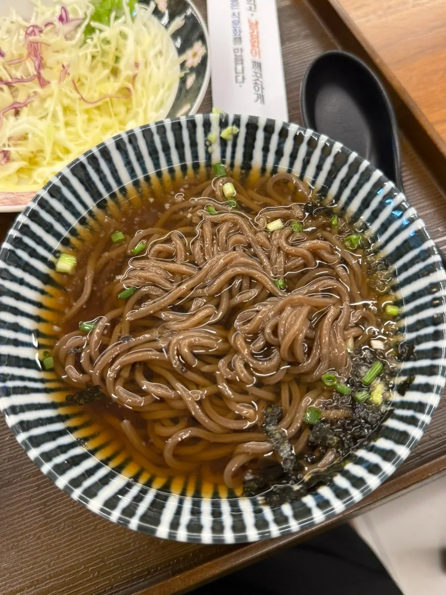 The flame-seared sushi paired with cold buckwheat noodles
