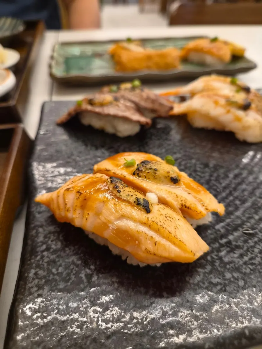 Close-up of Sushi Hwa flame sushi showing a seared surface