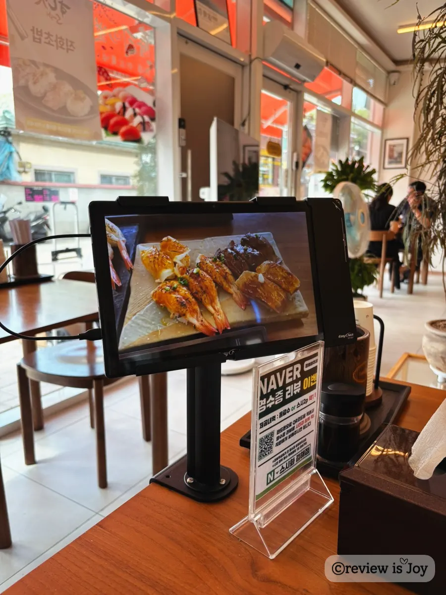 Tablet ordering machine on a table at Sushi Hwa