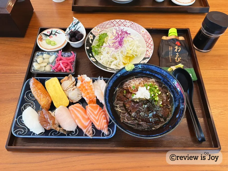 Mixed raw sushi set served with cold soba