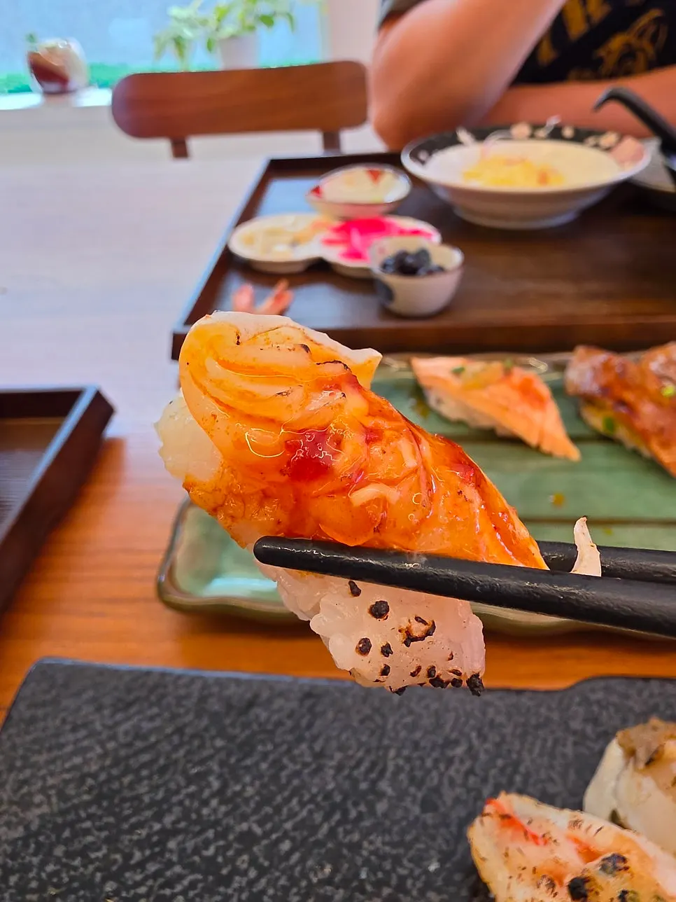 Cross-section of flame sushi showing small rice portions