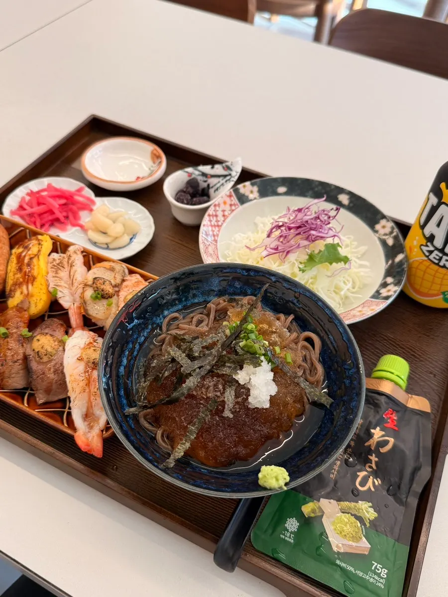 The ordered flame-seared sushi set laid out on the table